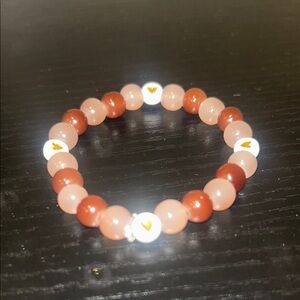 Elegant Pink and Brown Beaded Bracelet